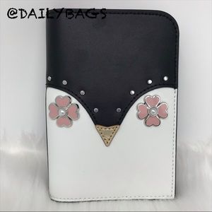 KATE SPADE PENGUIN BLACK WHITE PASSPORT HOLDER